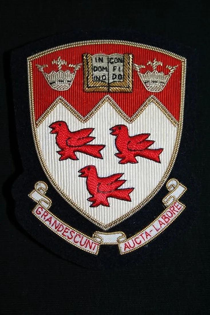 McGill University embroidered crest with the motto Grandescunt Aucta Labore