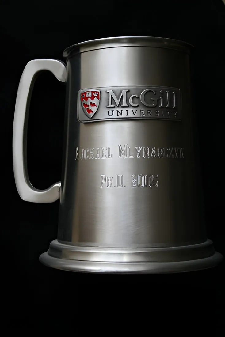 Pewter tankard engraved with the McGill University logo