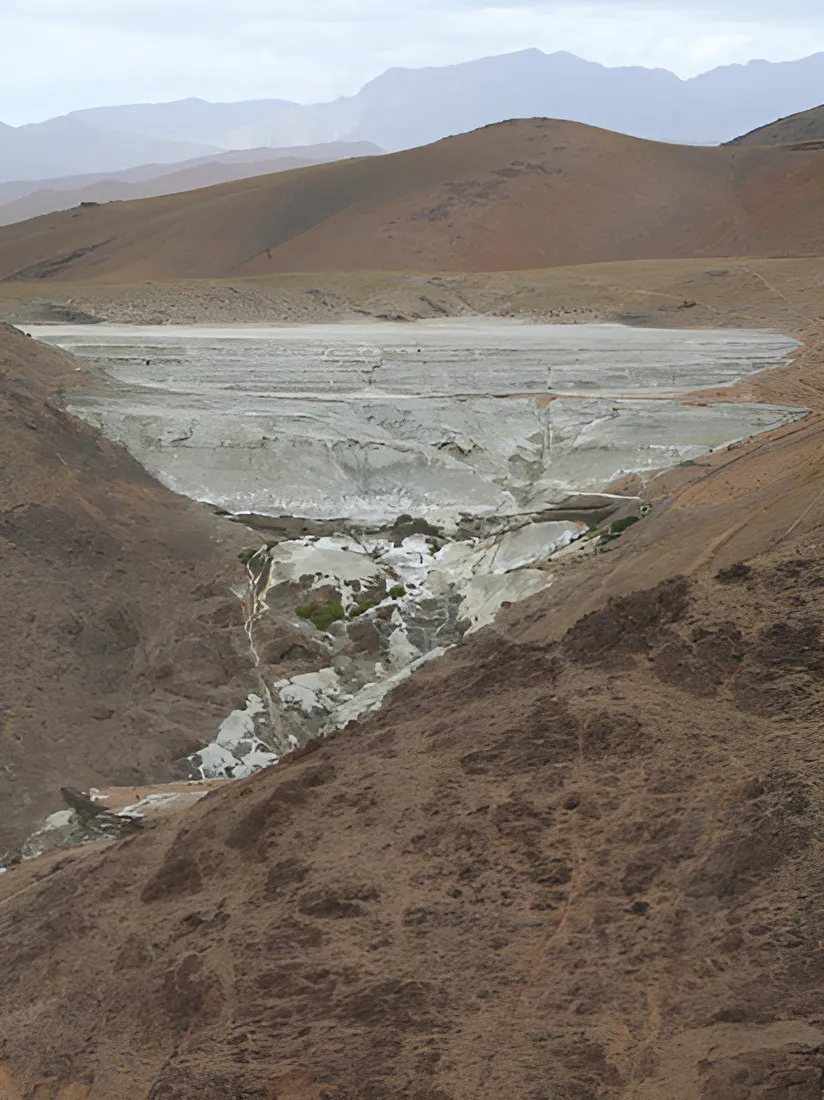 Tailings storage basin on arid brown hills